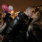 Couples share a tender moment during a flash mob to mark Valentine's Day in St.Petersburg, Russia. (AP Photo/Dmitry Lovetsky)