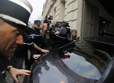 Dominique Strauss-Kahn arrives by car at a police station in Lille today