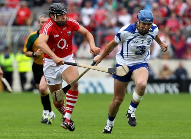 Cork's Sean Og O hAilpin and Derek Prendergast of Waterford.