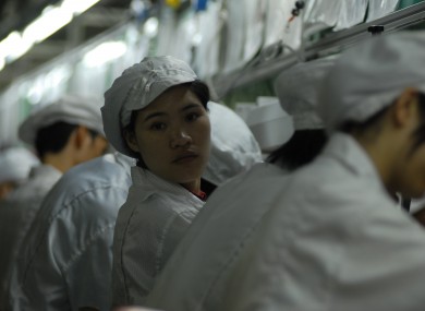 Employees at a Foxconn factory in Shenzhen in 2010