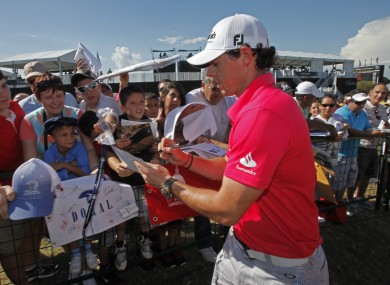 McIlroy signs autographs at the Cadillac Championship last weekend.