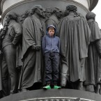 Brave guy watching the parade from the O'Connell statue. (Photo: Niall Carson/PA Wire)