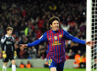 Messi celebrates after scoring tonight.