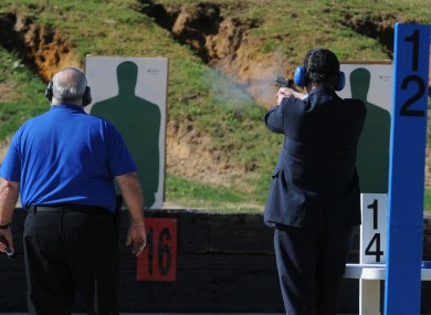 Santorum, right, at the firing range during a campaign stop on Friday morning.