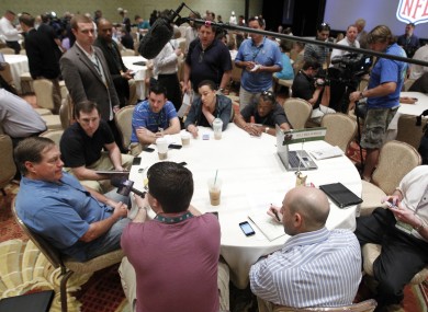 New England Patriots coach Bill Belichick talks to the media at an NFL owners day.
