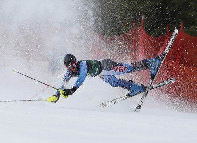 Seppi Stiegler, of the United States, crashes during the men's slalom skiing event during the US Alpine Championships.