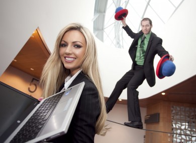 Rosanna Davidson pictured with tightrope walker Paul Quate at the launch of Microsoft’s Work from Wherever Wednesday