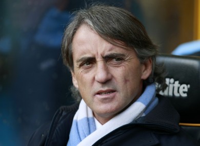 Mancini takes in the action at Molineux.