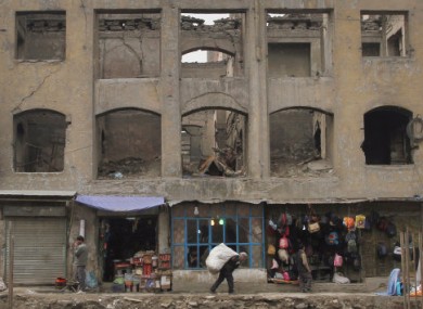 File photo of an Afghan street vendor in kabul on Monday.
