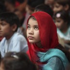 A Pakistani Christian girl, attends Easter mass at St. John's Church in Peshawar. (AP Photo/Mohammad Sajjad)