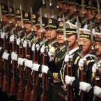 Chinese Honour guards line up before a welcoming ceremony for Turkey's Prime Minister Recep Tayyip Erdogan in the Great Hall of the People in Beijing, China. (AP Photo/Rajesh Kumar Singh)