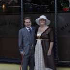 A couple pose for pictures in period costume (AP Photo/Lefteris Pitarakis)