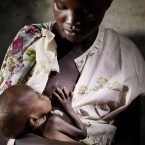 A malnourished child is fed by his mother in Adong,along the Sobat River in the Greater Upper Nile region of northeastern South Sudan, Africa.(PA)