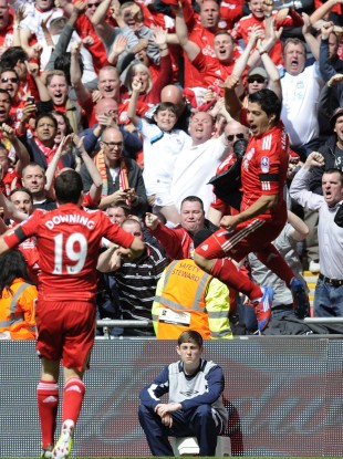 Luis Suarez celebrates his equaliser