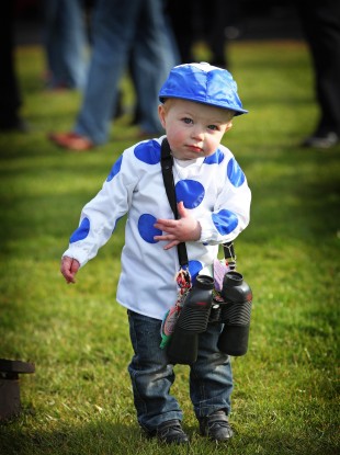 Young racing fan Kieran John Kelly (1) from Wicklow enjoying the races during day one of the Punchestown Festival.
