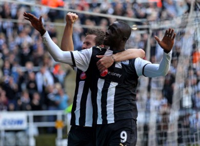 Cisse and Cabaye celebrate a goal against Liverpool last weekend.