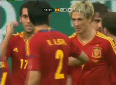 Torres is congratulated by his teammates.