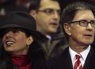 Liverpool co-owner John W Henry, right, stands with his wife Linda Pizzuti.