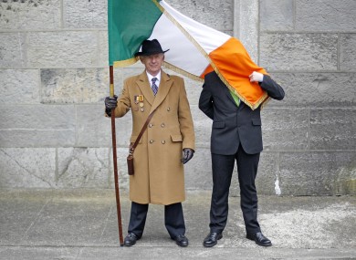 Men avoiding the windy weather at Arbor Hill in Dublin last Sunday