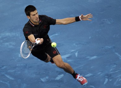 Djokovic returns a ball in Madrid yesterday.