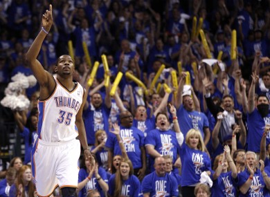 Durant reacts after hitting a basket against the Los Angeles Lakers in the third quarter.