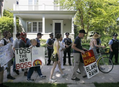 Police and protesters outside Mayor Rahm Emanuel's house today.