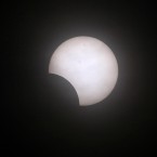 An annular solar eclipse is partially seen at sunrise today from the coastal township of Gumaca, Quezon province, 187 kilometers southeast of Manila, Philippines. (AP Photo/Bullit Marquez)