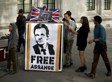 Supporters of Assange pictured last month