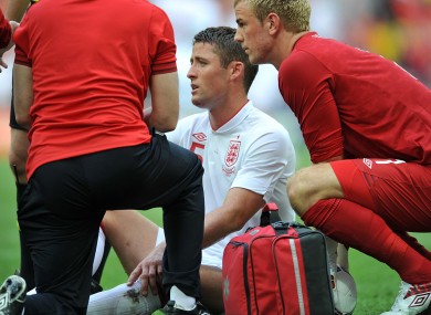 Gary Cahill was injured by England goalkeeper Joe Hart yesterday.