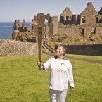 Olympic Torch Relay runner Jean Jones at Dunluce Castle. Image: Ben Birchall