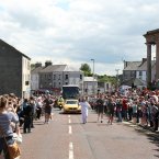 Torch bearer Clare Leahy carries the Olympic Flame through Coleraine. 