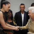 One is conscious of Robbie Williams checking out one's handshake technique (Dave Thompson/PA Wire/Press Association Images)