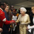 One wonders how Will.i.am managed to pilfer that uniform from the Beefeaters' changing room (Dave Thompson/PA Wire/Press Association Images)