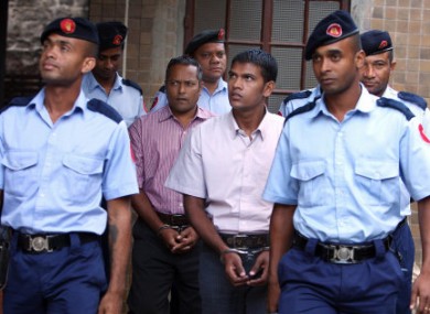 Avinash Treebhoowon, 30, (right) and Sandip Mooneea, 42, at the Supreme Court in Port Louis today.