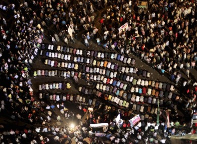 Egyptians pray at a protest in Tahrir Square in Cairo earlier.
