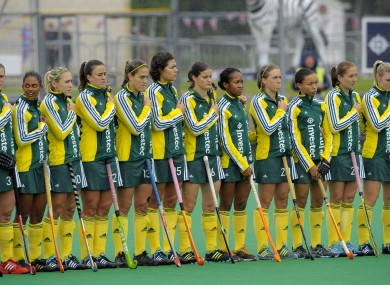 South Africa players stand as the wrong anthem is played yesterday.