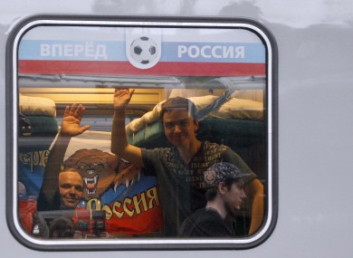Russian soccer fans leave for the Euro 2012 to Poland by special train from Moscow yesterday.