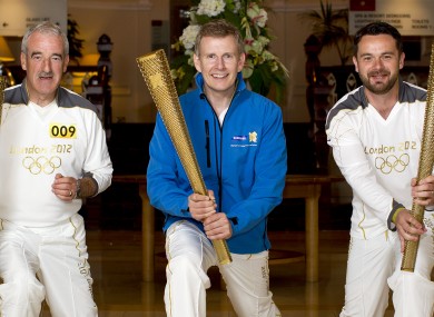 Patrick Kielty (centre) celebrates carrying the Olympic Flame with fellow Northern Irish Torchbearers (009) Tony Fearon (left) and Ryan Miskelly on behalf of Samsung.