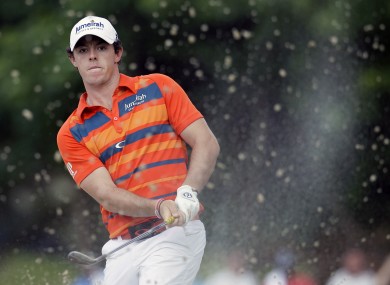 Rory McIlroy watches his shot from the sand on the 17th hole at the St Jude Classic golf tournament.