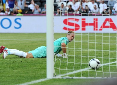 Joe Hart can't stop clubmate Samir Nasri's effort.