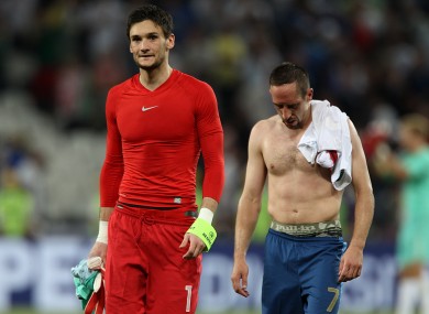 Franch keeper Lloris with team-mate Franck Ribery.