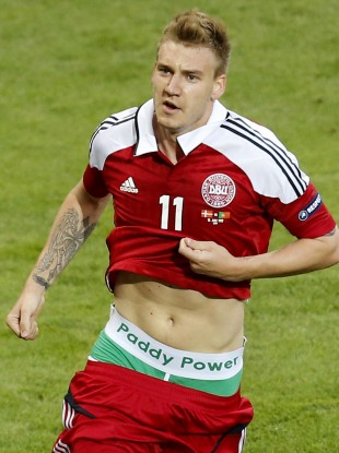 Denmark's Nicklas Bendtner celebrates after scoring during the Euro 2012 soccer championship Group B match between Denmark and Portugal in Lviv.