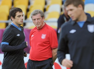 Roy Hodgson watches England training last night.