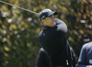 Tiger Woods had started the day three strokes behind Michael Thompson.