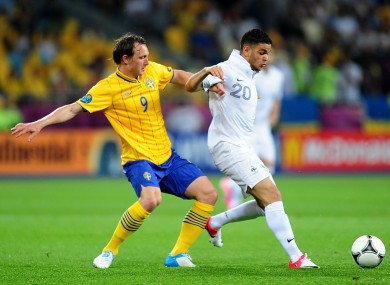 Sweden's Kim Kallstrom (left) and France's Hatem Ben Arfa battle for the ball.