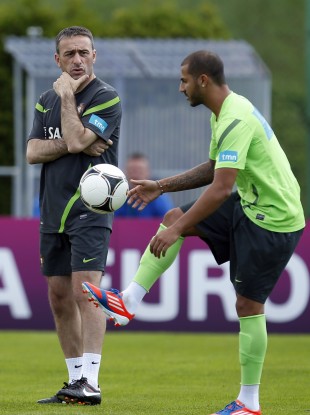 Paulo Bento talks to player Ricardo Quaresma before it all kicked off.