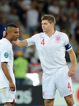 Gerrard consoles Ashley Cole after his penalty miss.