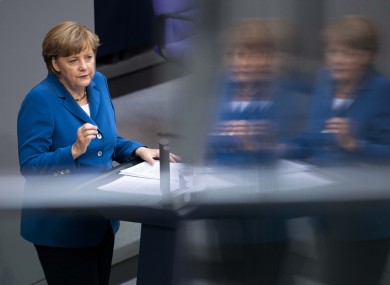 Angela Merkel addresses the Bundestag ahead of the two-day summit in Brussels.