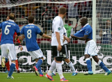 Italy celebrate as the dejected Germans look on