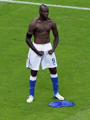 Balotelli celebrates scoring his side's second goal.